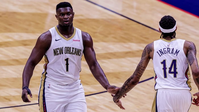 New Orleans Pelicans forward Zion Williamson (1) is congratulated by forward Brandon Ingram.